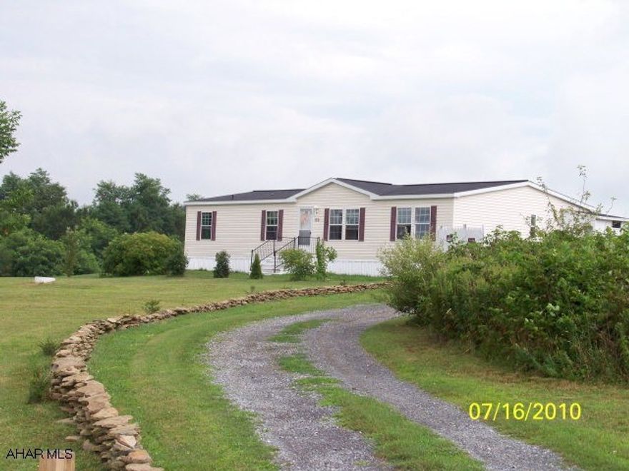 Newer mobile home on 3.3 acres in a very secluded neighborhood, Breath taking views surround this private setting, home is move in ready.