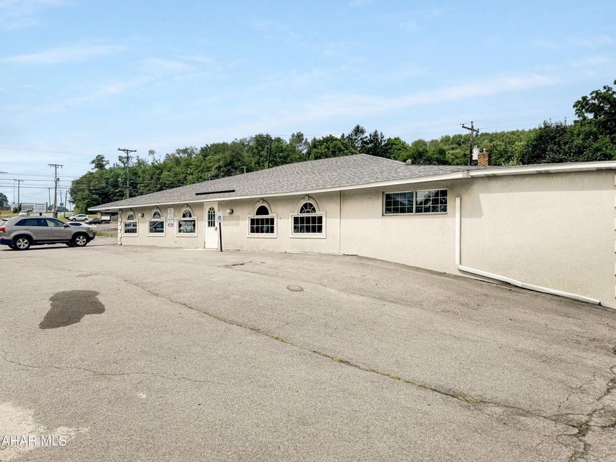 Approximately 1,650 square feet of office space located in the incredibly busy area of Mundys Corner! This unit was previously occupied by a Chiropractors office but is set up for just about any business you could imagine. This property sits on a corner lot directly across from Kwik Fill, Kimmie's Kitchen, & a busy automotive service station. Directly down the road is Sheetz, MorGainz Fitness, & quick access to Route 22. Rent includes all utilities. The other unit within the building is currently occupied by a Notary. Call today for a tour!