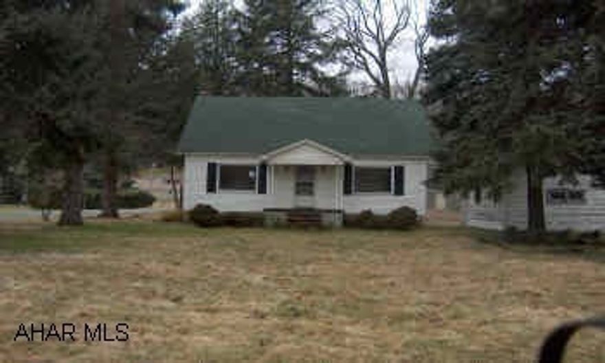 Nice 1.5 story, needs some tlc.  lot is approx. .49 acres. There are 2 lots, 100x 142, 50 x 142.  Detached garage.  sold "as is" see listing agent for addendum.