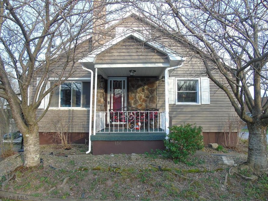 Home Sweet Home on Horseshoe Drive! Looking for a family home on a large, beautiful lot in a quiet neighborhood?  Look no further!  This 3 bedroom 3 bath home sits on a spacious, flat lot in the city.  It boasts of hardwood floors, cute built in shelves, and a first floor master bedroom.  The basement is a finished family room with a huge woodburner.  Enjoy a covered, outdoor seating area between the home and the garages, an open deck to enjoy the sun, or the private side yard to sit around the fire on those cool summer nights.  On the back of the one garage is a workshop area.  Don't miss out on this house!