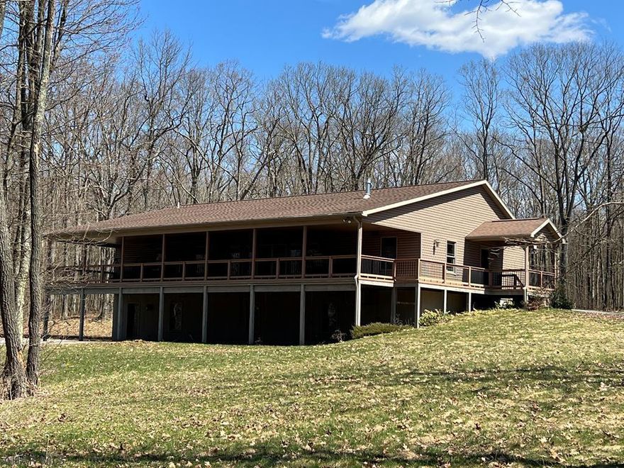THIS IS THE ONE! Find seclusion at this beautiful home while still being an easy 30-minute drive to State College or Altoona. This raised ranch has an open floor plan with a spacious custom oak kitchen that opens to the large family room. Also, on the first floor is a walk-in pantry and laundry room. Unwind on the large wraparound porch that overlooks all that mother nature has to offer. This home features an owners' bedroom with a large owner's bathroom and walk-in closet. Pull up in the wraparound driveway with enough parking for a boat, camper, or multiple guests. The property sits on 1.03 acres with an additional acre included on a separate deed. The Geothermal system makes this property as energy efficient as they come. The basement is drywalled and ready for finishing.