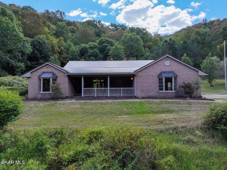 If you are looking for a HOME surrounded by wildlife and nature, this is it! Was lovingly built with high quality materials , all the woodwork was custom made.Home has only been lived in by the original owner. Very close to State Game Lands. Full Brick exterior, Brand New metal roof and New garage doors. Privacy and views out every window. Has a large living room with propane brick fireplace. Nice primary suite with walk-in closet and large bathroom. Relaxing all season sunroom. Don't miss the unique ceilings in living room and primary bedroom. Heat pump with oil back -up, central air. Large unfinished basement, garage has a 1/2 bath. Home has been full of lots of Love and Laughter. If having Peace and Tranqulity is on your wish list , look no further. Call today to take a look.