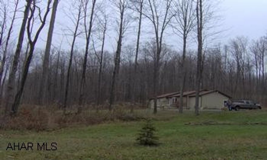 Great country location! 3 bedroom 2 bath ranch on 7.8 acres.