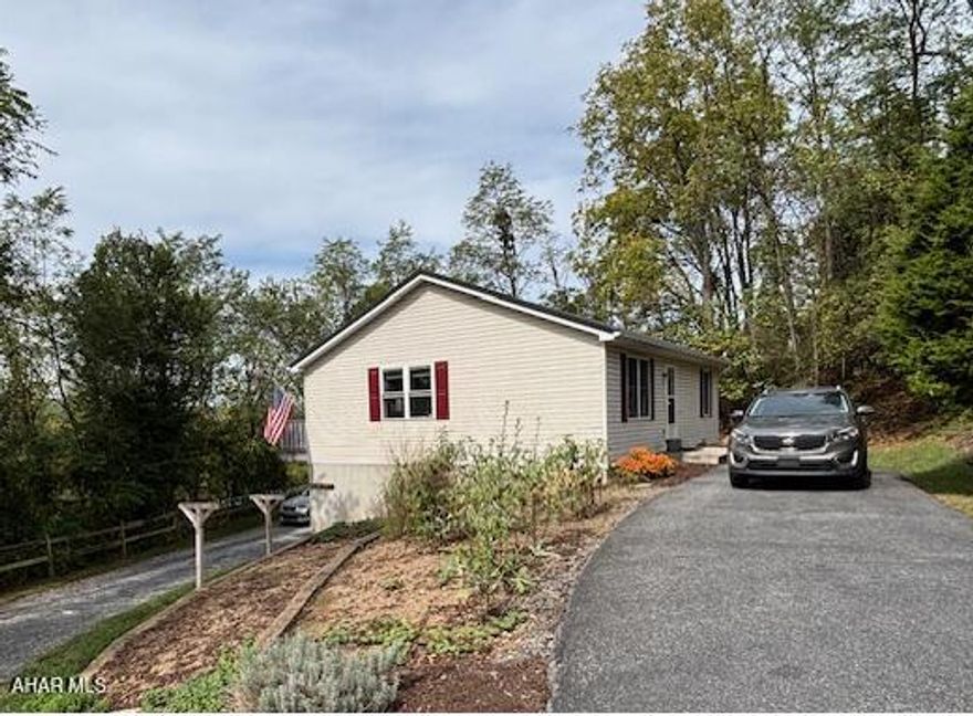 This is a must-see property. It's been well cared for, move-in ready, and waiting for you to check it out! This ranch style home sits peacefully outside of Bedford. Offering a view that could overlook the town.

Inside, the main floor offers two bedrooms and a full bath, while the lower level features a spacious room with an additional full bath that offers endless possibilities for example a master suite, play, or recreational room.

The outdoor space is just as inviting, with room to garden, relax, or entertain by the beautiful fireplace.

Check out this house, and make it your home.