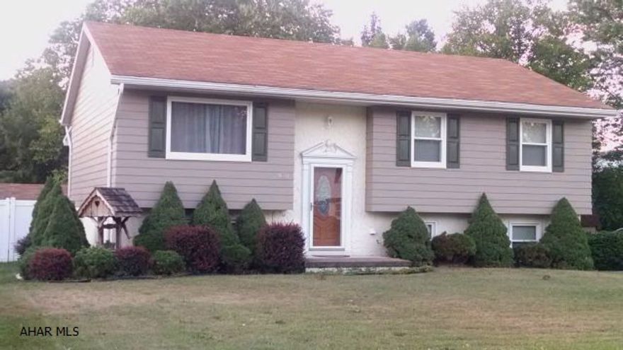 Must See! Very well maintained 3 bedroom, 1.5 bath bi level, new windows, furnace, CA, hot water heater and much more. Beautiful, spacious, fenced back yard, decking and patios, tons of parking, just walk across the street to the park. Property is listed below appraised value, Awesome!!