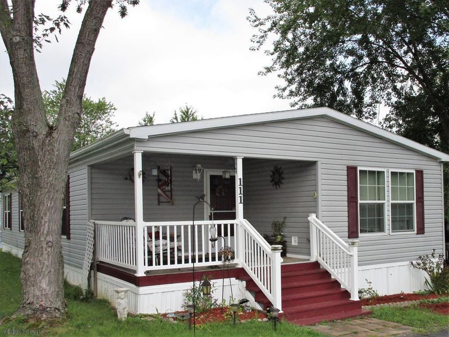 What a great home layout waiting for you!  This 2009 Champion is 26x60 and has an open concept leading from the living room into the dining room and kitchen.  The kitchen has great counterspace along with a sit up bar/island.  3 spacious bedrooms and 2 bath home with a laundry room leading to the side deck.  Kick back and relax on the covered front porch.  A storage shed is included.  Buyer must submit application and be approved.  Lot is rented.