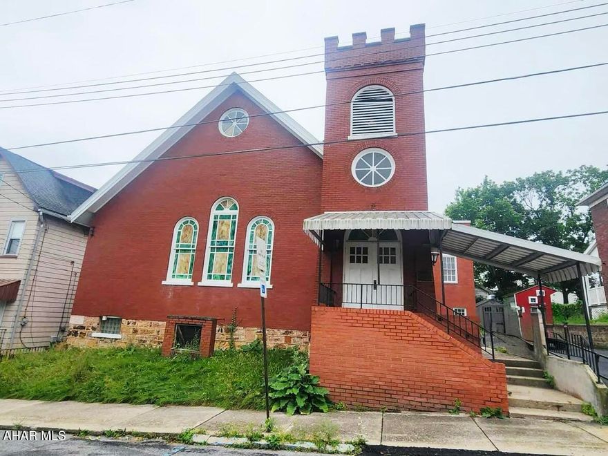 Discover a unique opportunity to own a piece of Hollidaysburg history! This spacious 4,900 sq ft church, located in the borough's historic district, awaits your vision and restoration expertise. The building provides ample space for a variety of potential uses. Ideal for redevelopment into a unique space, community center, or creative business venue. This property is in need of significant remodeling and repairs. Bring your contractor and imagination to unlock the full potential of this historic gem. Property is being sold in as is condition. Please contact listing agent to schedule your showing today.