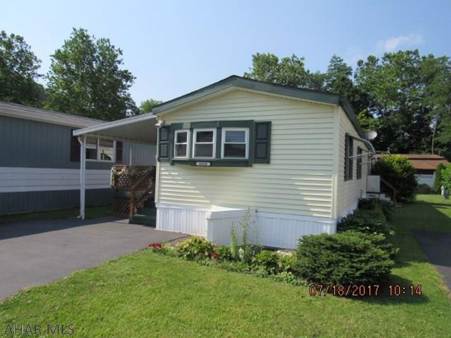 Very nice single wide. New kitchen, bath and central air in the last three years. Roof, windows and siding done in the last 8-10 years. Large covered porch. Shed. Move in ready. Lot rent is $352...includes water, sewer and trash. Oil tank is full.