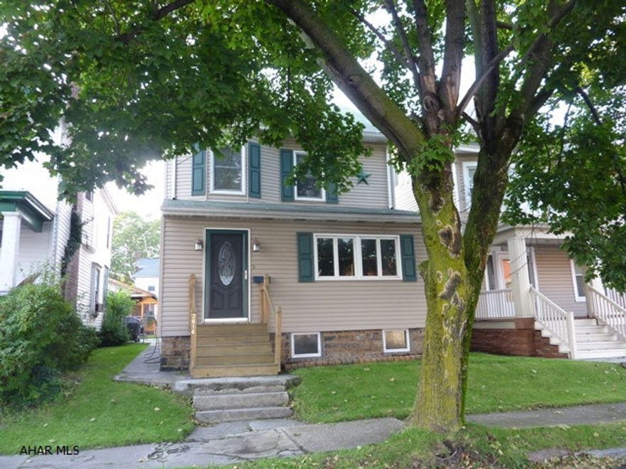 Nicely remodeled home with original woodwork, large open foyer and hardwood floors. Large formal dining room and bonus space with front sun room. Gorgeous fenced back yard with new deck and patio. 3 off street parking.