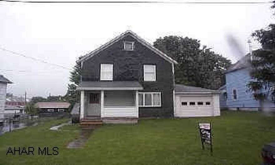 good starter home with attached garage on nice lot.