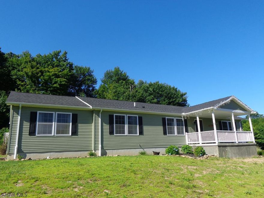 Your private location family Dream home on over 6 acres! This is an exceptional modular home with 5-7 bedrooms, 4 bathrooms, enormous finished basement that could be a mother-in-law suite with a kitchen. One of the bedrooms has been converted into a huge walk in closet. Home is only 6 years old. Nicely landscaped with fruit trees. Lots of storage space in basement.  2 car garage, A/C.  Nice finished family room with fireplace.  2 spacious Master Bedrooms with master bathrooms.