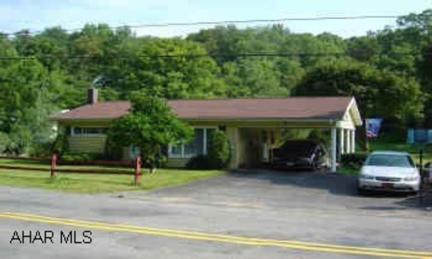 Vinyl Rancher on 3/4 Acre. 3 Brms, BA, Kitchen L.R., Carport, Shed, Large Basement. Possible Horses?