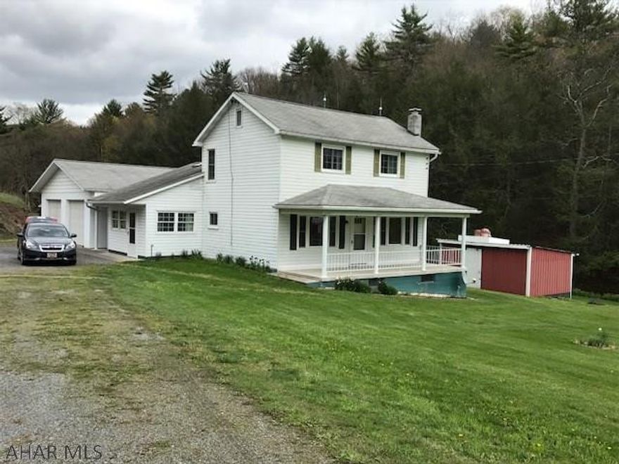 2 story home with large attached 2 car garage and an additional small garage and several outbuildings.  Big kitchen with large island.  Home is located on over 6 acres of beautiful ground with a very large yard.  Very clean and neat property.