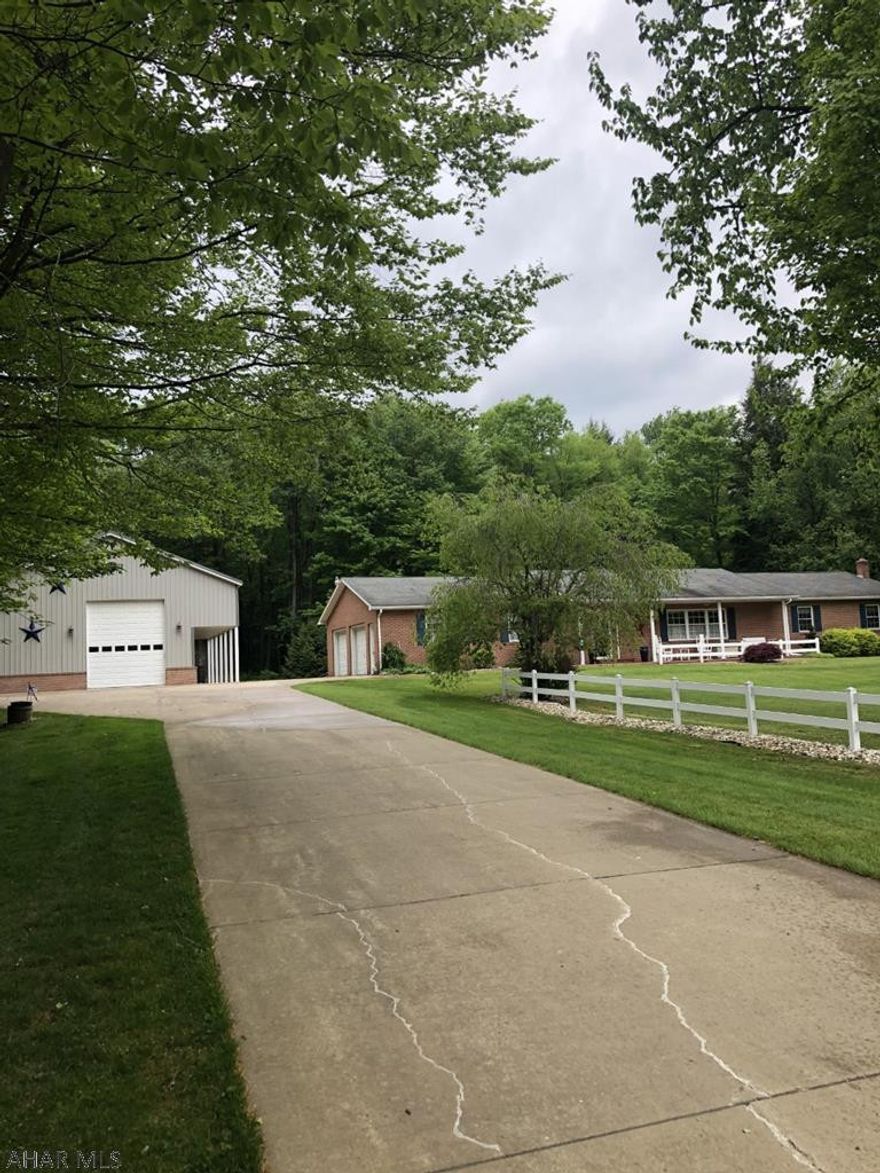 Ebensburg- 3 BR, 4 1/2 bath brick ranch home. Totally remodeled kitchen with Corian counter tops. Island bar area. Immaculate home! 2 car attached garage & a 32 x 48 detached garage. One of a kind property! 2.92 acre lot.