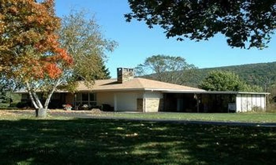 Stone and Vinyl 3BR/1full and 1 3/4 bath ranch home. Lovely well-maintained stone and vinyl 3BR/2BA ranch home with central air, OHW heat and partially finished walkout basement. Located 5 miles from downtown Bedford on a nice level lot with a variety of nice mature trees. Home features newer kitchen with oak cabinetry, MBR suite with full bath, LR with wood-burning fireplace and large family room with lots of windows to enjoy the views of the mountains. The basement offers a den with wood-burning fireplace, playroom, workshop and laundry area. Other amenities: attached garage and two-bay carport, circular paved driveway and a 16x14 storage shed.