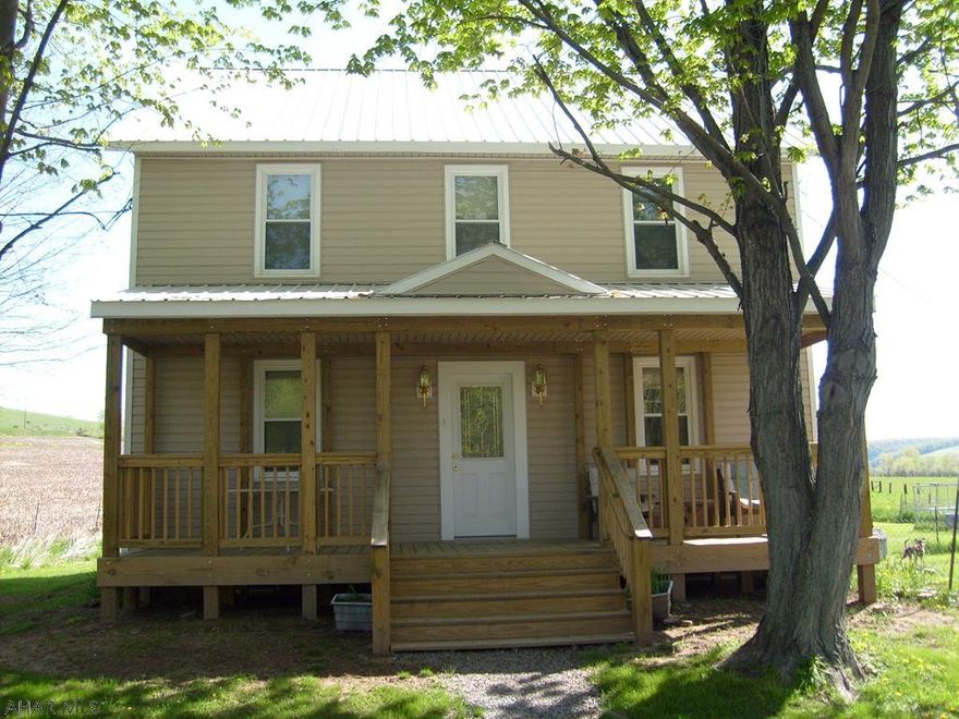 Nice open and flat property great potential for horses or cattle.  The house has new siding, roof, windows, and porches.  Built to last located in the Chestnut Ridge School district.  If you want space and country living check this property out.