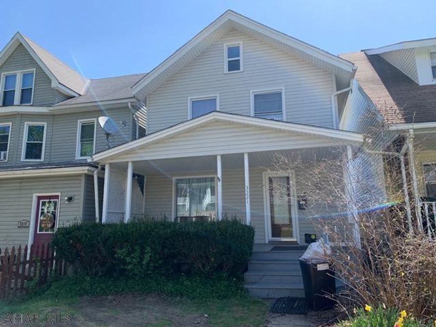 Very nice two story completely remodeled in 2013 including new vinyl windows and siding.  New roof in 2019.  Newer furnace, water heater, ceramic floors in kitchen and bath.  SS appliances.  Dining room has window seat for storage, HW flooring.  Large living room with hardwoods leads to open front porch?  Open rear porch with Sunsetter awning.  Master BR is very large and would accommodate a sewing or computer area.  Bathroom is updated with a laundry closet which contains stackable appliancs.   Fenced rear yard  opens to large one car garage which allows for additional storage.  Enclosed storage area under the rear porch.  Don't wait to preview this home!  Possession June 30 or later.  Front lawn will be reseeded as weather permits.  PARK IN REAR AT GARAGE TO VIEW HOME.