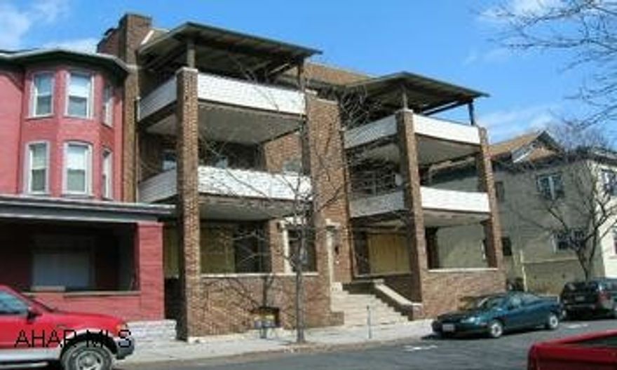 3 story brick apt. bldg with 6 units. 6 furnaces. Basement laundry area. Building is currently vacant.
