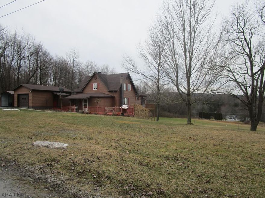 1.5 story remodeled home on 3 acres.  One car garage and a one car alumn carport..