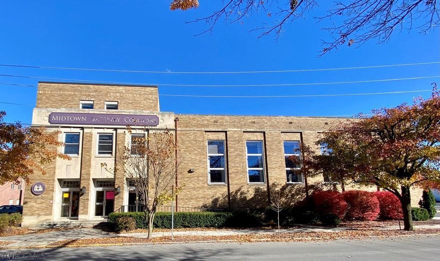 This property is waiting for YOU!! Bring your vision to transform this historic building that has been a staple for many years in the heart of Huntingdon. Opportunities are endless for a multi-use facility with 15,000 square feet, of which 6,000  encompass a gymnasium. The large classrooms with high ceilings and original woodworking, some with beautiful built in cabinetry, could be converted into office space or apartments. It would be a convenient location for residents of Huntingdon for a medical office building, housing multiple physician offices or a midtown retail facility. The building has central air, new windows, rubber roof, several restrooms, two kitchens, and ample parking. Most recently known as Huntingdon Events Center & Midtown Gateway Commons Building. MOTIVATED SELLER!!!