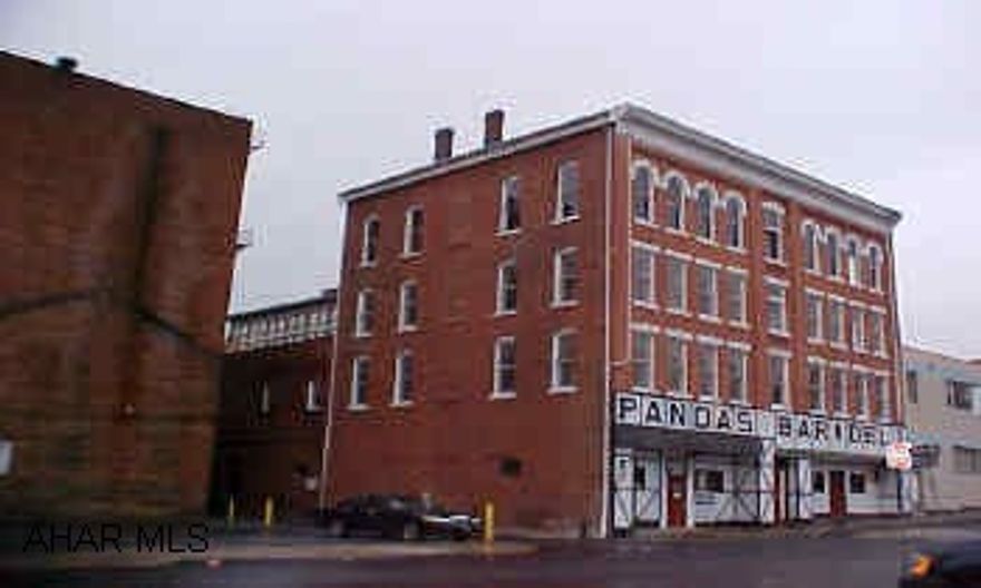 Seller "Christiana Bank and Trust Company as the Owner Trustee of Security National Funding Trust" - Previously Bar, Deli, and 9 Apartments. J-687 Seller "Christiana Bank and Trust Company as the Owner Trustee of Security National Funding Trust" - Previously Bar, Deli, and 9 Apartments. J-687