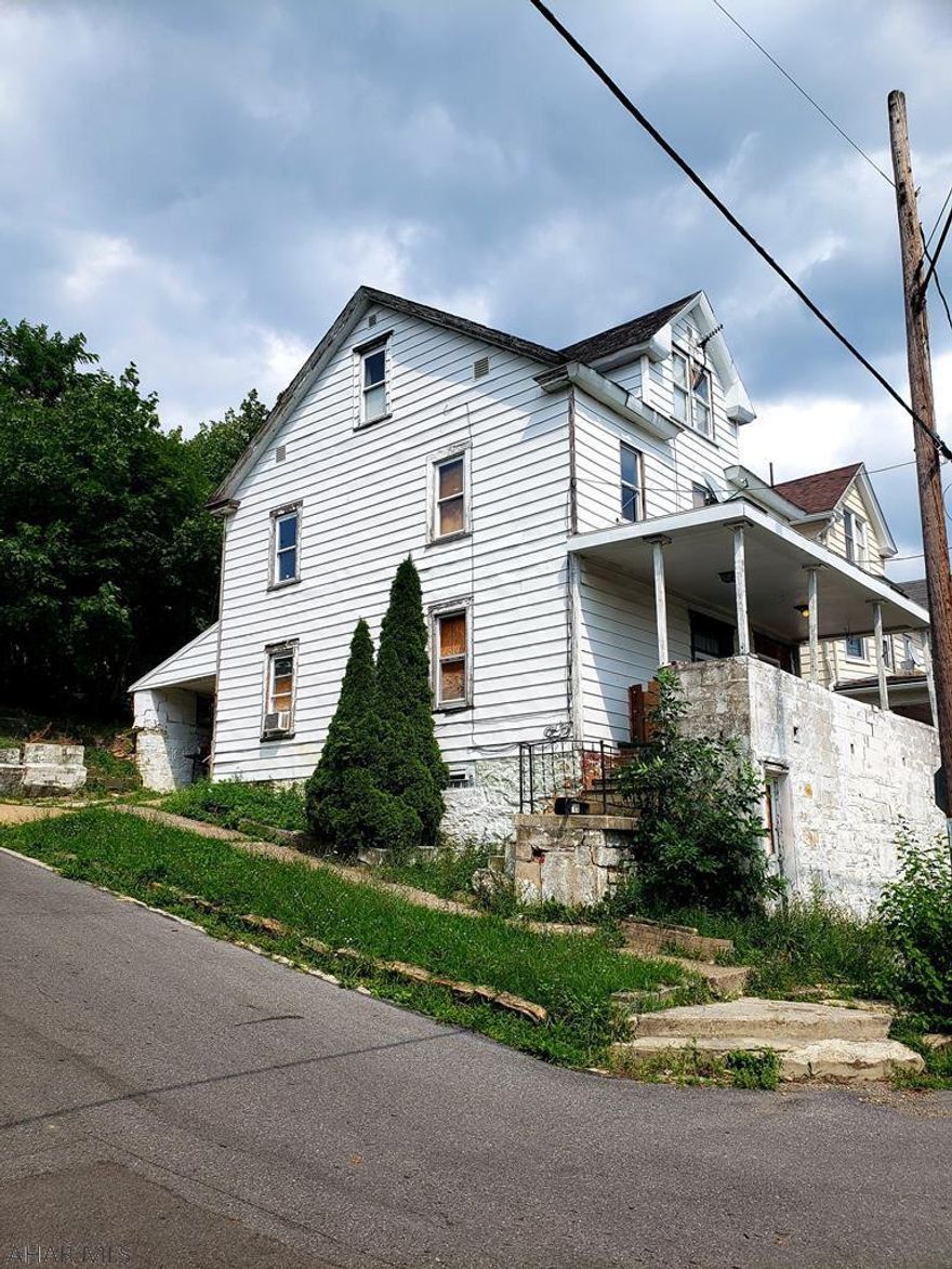 Handyman special.  House could be large rental or single family home. Owner occupied, please call office for showing.