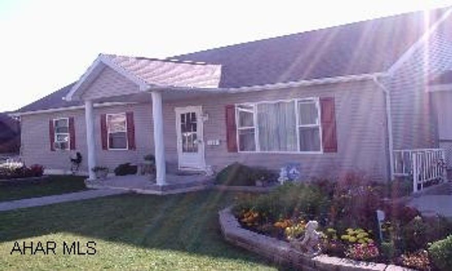 Lovely Breezeway Lovely modular home, Excellent condition, Bar in basement, Double lot. 2-2 car garages. 51-003-101