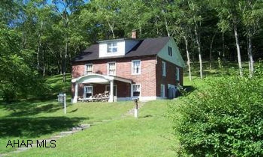 A Hunter's Paradise with the original brick Homested!!!  Wildlife galore with bear, deer, turkey, and squirrels! The property adjoins the Raystown Branch of the Juniata River which offers plenty of fishing and boating. HUNTER'S PARADISE!!!!!!!!  Property adjoins the Raystown Branch of the Juniata. Surrounded by Wildlife! A Hunter's Retreat.   Grounds Very Well Maintained.  Mature Timber!!