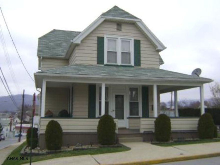 Spacious & immaculate corner home with wrap around porch, family room (could be 4th bedroom) large eat-in kitchen, 1st floor laundry & 3/4 bath. Well insulated, newer roof, furnace & windows. Abundant storage. Lovely yard with garage & driveway.
