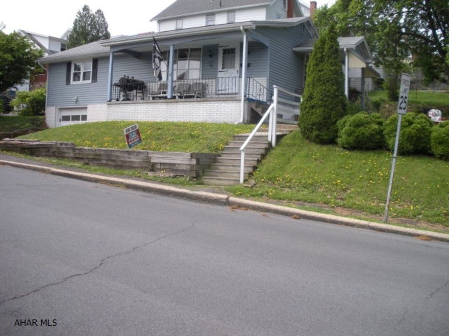 Nicely maintained 1 story home on corner lot.  Vinyl exterior, 1 car garage. This home is currently used as a 2 bedroom but could be a 3 bedroom by using the room currently used as a dining room.  All bedrooms have hardwood floors, kitchen has room for a table.  Nice covered front porch & side porch, the basement has new drywall-great family room space.