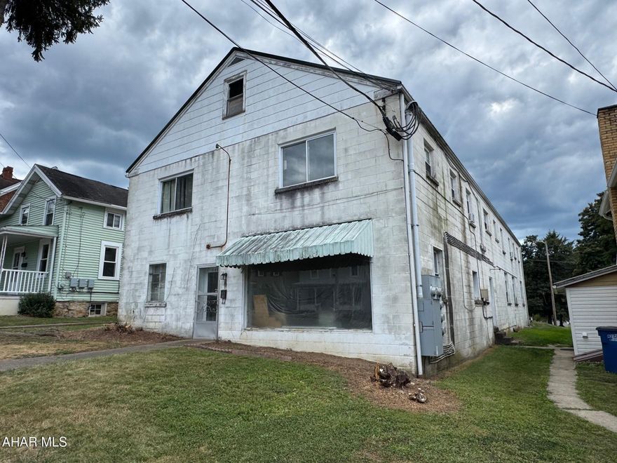 Great location on this six-unit apartment building resting in the Bedford Borough. Situated just across the street from the Shuster Heritage Trail, close to the Bedford Elks, Omni Bedford Spring Resort, and downtown Bedford. Five of the units are currently rented and occupied and the other unit needs a total renovation. ALL utilities are separated, including electric, water, sewer, and heat. Heat is electric BB for each unit. Sizeable building with a street to alley lot and rear asphalt parking area. With some updating and renovations, this could be an outstanding investment property. There are three, two-bedroom units and three, one-bedroom units.