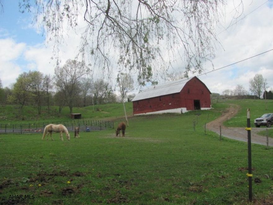 Looking for a hobby farm or a place to raise some animals for 4H, This is it! The home has been refurbished and additions have been added to allow for a large family room and 3/4 possible bedrooms. New flooring has been added throughout the house including hardwood floors in the Living room, new Linoleum flooring in the kitchen and new carpet in the dining room area. The exterior of the home has newer vinyl siding and newer roof. The property comes with a 42x50, 2 story Barn with 4 horse stall areas, a tack room and a run in area. Barn is complete with electricity and water service. The property currently has 2 areas that are fenced for pasturing, one area in electric fencing and one in the 8ft high tension fencing. Total taxes do not reflect a 173.75 Homestead credit.