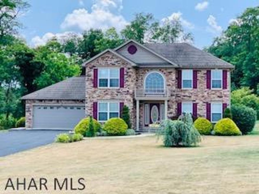 Beautifully, well maintained 2 story colonial revival home sits on 3.051 acres beautifully manicured yard and landscaping!  Lovely stacked stone front porch adds a stunning entrance. The large living room is spacious and open. The kitchen cabinets are maple crafted cabinets w/ stainless steel appliances, granite counter top,ceramic fl tile and pantry. The french doors offers a nice view of the backyard and patio and shed. Off the kitchen is a 1/2 bath, separate laundry area that leads to the 2 car garage. The formal dining area can be a bonus room or entertainment room. The master bedroom has a large walk-in closet and spacious master bath.  The large drive way provides a turn around and extra parking.  The gazebo add another extra for enjoying the views! The shed for storage/lawn items.