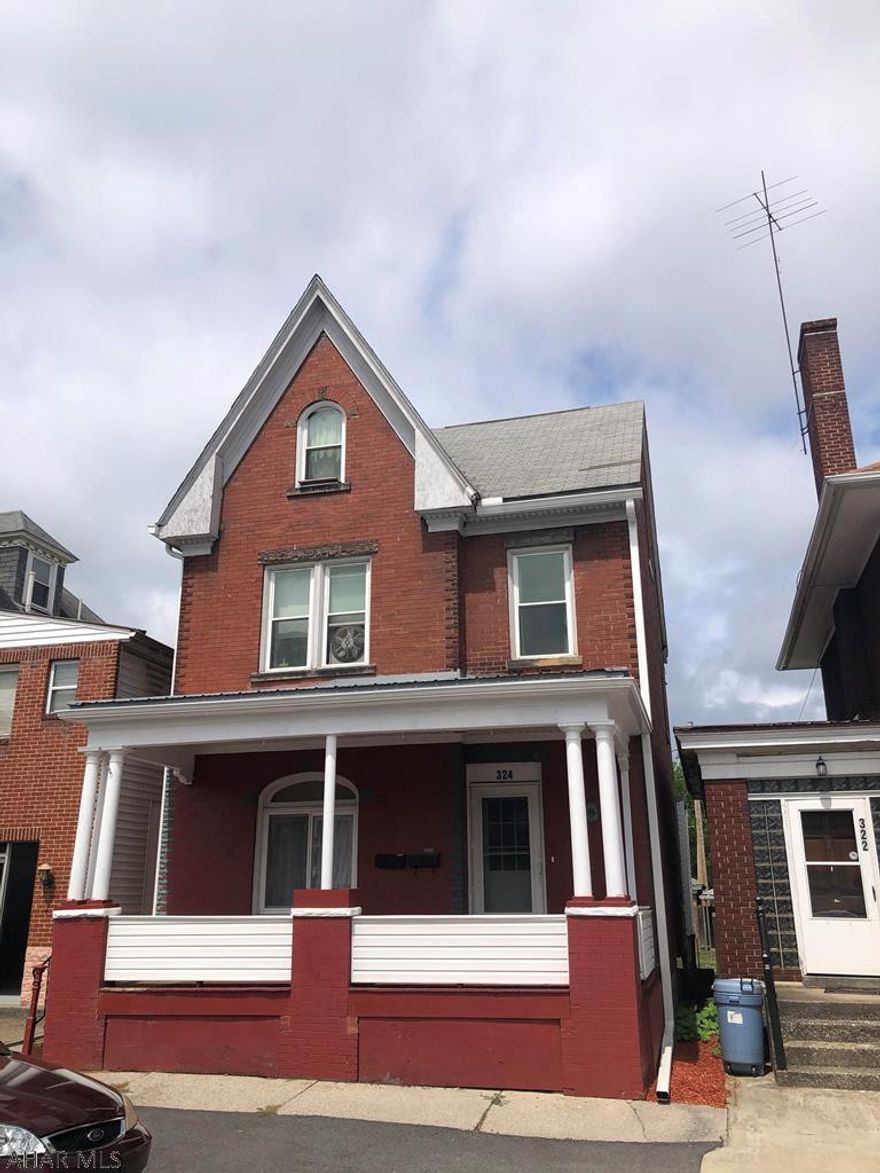 Nice brick 2 unit duplex with long term tenants. 1 car detached garage that has rental income also. Current rental certificates. Seller is replacing the garage roof. Can be purchased along with 320-24 5th Avenue, which is next door.
