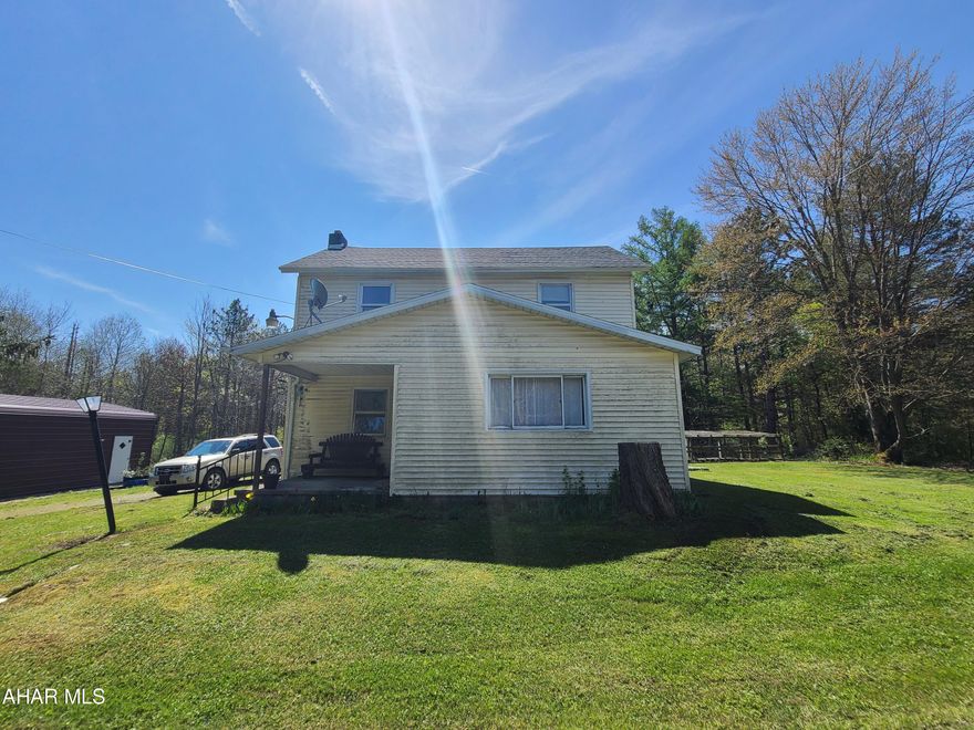 4 bedroom and 1 bath farmhouse on 1 acre. County living and privacy. Small barn and 2 sheds on this property. 2 car metal garage. 
1st floor of home has been updated. 2nd floor still needs work. Spacious attic. Newer roof.