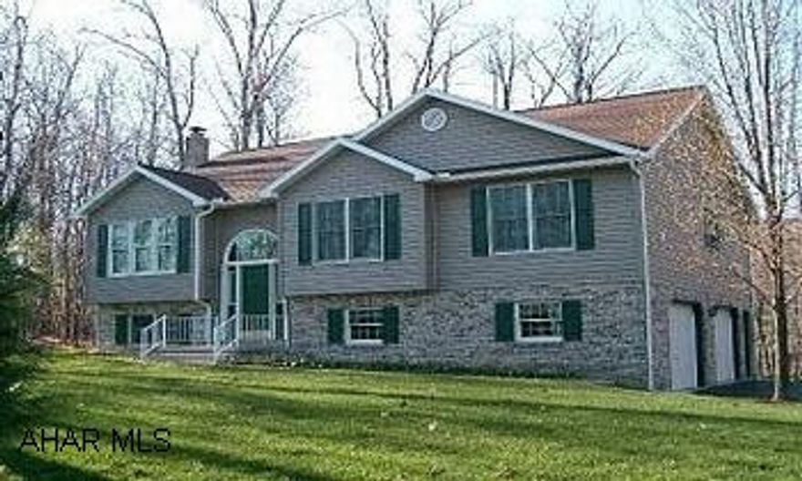 LAUREL HEIGHTS RESIDENTIAL SUBDIVISION!  GREAT HOME, GREAT VIEW, PRICED TO SELL! BEAUTIFUL BI-LEVEL ON 1.61 ACRES!  HOME 32-1/2 X 44, BUILT IN 1996, WITH FINISHED FAMILY ROOM, 1ST FLOOR LAUNDRY, CENTRAL AIR, AND SPACIOUS DECK (12X16).  2-1/2 CAR INTEGRAL GARAGE.  VERY PRIVATE!