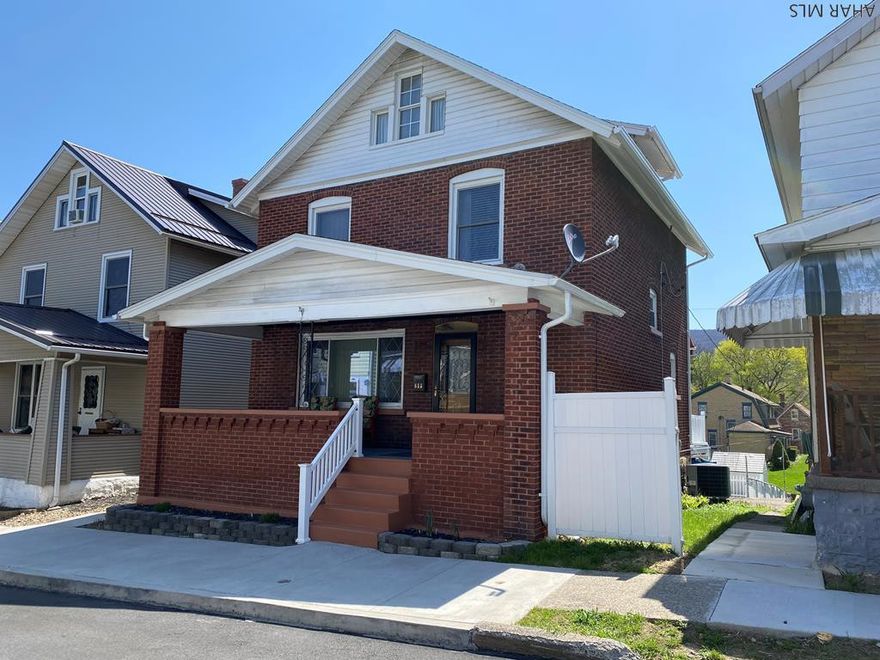 Tastefully updated and meticulously maintained brick home that's move-in ready!  With 3 bedrooms and 2 updated baths, newer kitchen, newer roof plus additional features that include central air, off-street parking and some fabulous outdoor space, this won't last.  You can be moved in in time to fully enjoy your summer on the deck with the new Sunsetter awning overlooking the inground pool plus there's an amazing front porch and lower patio area as well. Take a look, you won't be disappointed.