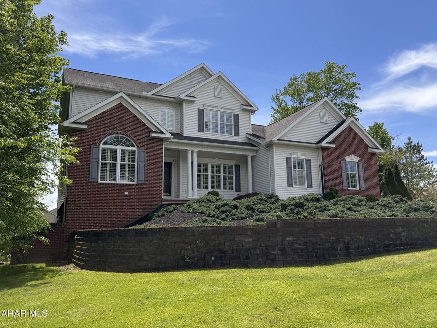 Exceptional 4 BR, 3 1/2 Bath home on over 1/3 acre lot in S & P Estates in Ebensburg.  Spacious kitchen with granite countertops & center island workspace.  Gas, forced air heat with central air.  Additional living space in the basement with kitchenette, FR with gas fireplace, full bath, and playroom.  2 Car attached garage. Approximately 4,400 square feet of finished living space.