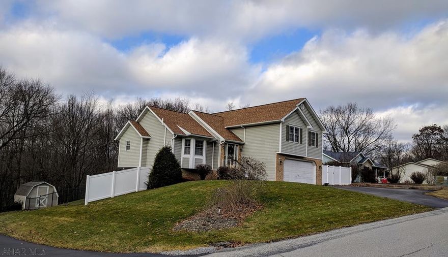 Beautiful home with over 2500 sq.ft. of total living space in Bellwood SD, convenient to I-99 with a short commute to State College and Altoona. Located in BelAire Estates the home has 3 bedrooms, 2.5 baths, heated 2 car garage, HUGE closets with tons of storage space, 3 separate living spaces w/ plenty of room for kids to play or entertain guests, fenced in backyard w/ shed and a large deck overlooking woods along with an electric underground fence surrounding the entire property perfect for dogs. A brand new roof in the summer of 2016, fence in 2017, completely remodeled bathroom in 2018, among other great updates/features. Call today for your chance to own this beautiful home! Agent Owned.