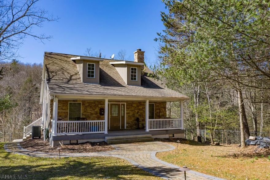 You won't want to miss this Cozy well-maintained home located only 3.5 miles from Huntingdon on over two acres, nestled in the mountains close to Snyder's Run Boat Launch.  Enjoy the privacy and peaceful setting of this 2 bedroom with loft sleeping area, 1 3/4 bath, 1 1/2 story home.  Features include high-end detail throughout, vaulted wood ceilings, custom made kitchen cabinets, and captivating floor to ceiling stone fireplace, with open floor plan.  This home is great for entertaining inside and out.  Enjoy grilling on the back porch listening to the sounds of the great outdoors and grill some marshmallows in the outdoor fire pit.  Great for a vacation getaway at the lake or year round living.  Be sure to check out the 3-D Video to view a complete walk through of this amazing home.