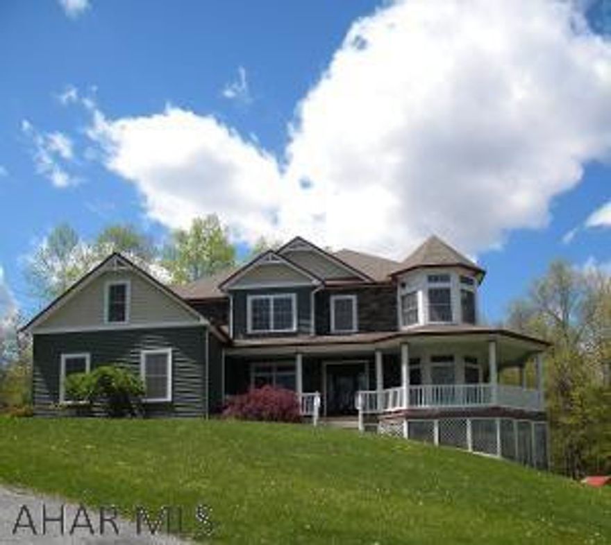 This is a one of a kind home in desirable Pleasantview Estates situated on 3.39 private acres w/breathtaking views! If you are looking for privacy this is the one for you! 5 BR's & 4 baths. The master  boasts a 7.8 x31.8 walk-in closet, a sitting room, and a beautiful bath with a custom tiled shower & jacuzzi tub. Beautiful Great Room with a stone fireplace open to the spacious kit. with an island,  granite, glass tile, and tons of cabinet space. Don't miss the separate pantry off the kit. HW & tile floors throughout. Fin. lower level with  a FR, BR, full bath, exercise room and plenty of storage. Garage parking for 3 cars and a work area. Wrap around Timber Tec porch to enjoy the views! Custom rod iron front door. Fenced inground pool. Sale includes 2 additional parcels. 166 & 167.