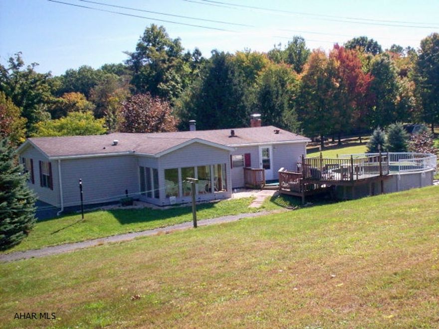 Ranch home on 1.5 acres, great open setting, some woods. Four bedrooms, 3 full baths, lovely sunroom off of kitchen, open floorplan with kitchen and living room, fireplace, master suite, first level laundry room. Full finished basement with wood/coal stove, family room, bedroom and full bath. Large back deck, shed.