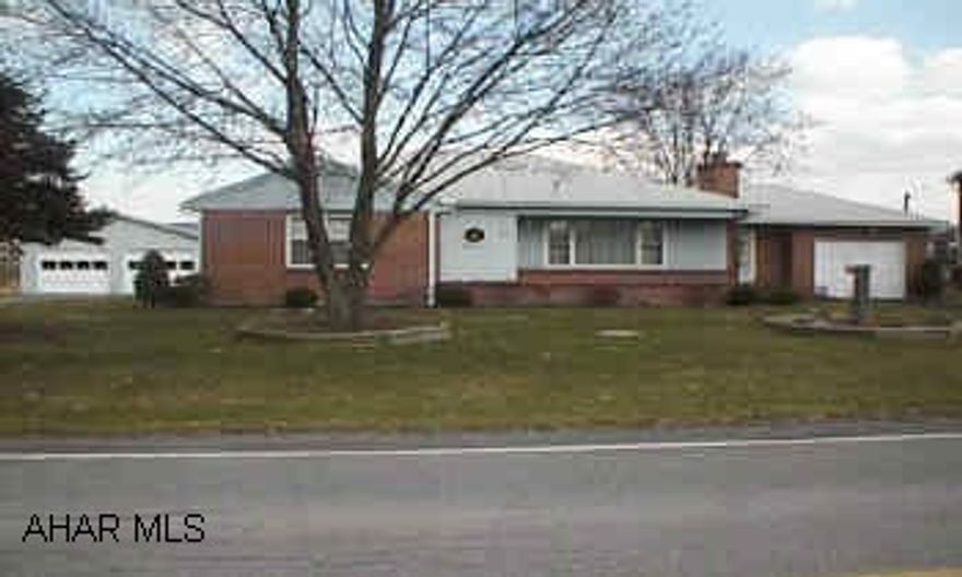 Nice 3 bedroom Ranch.  Living room with fireplace, new oak kitchen and bath, family room and 3 car garage.