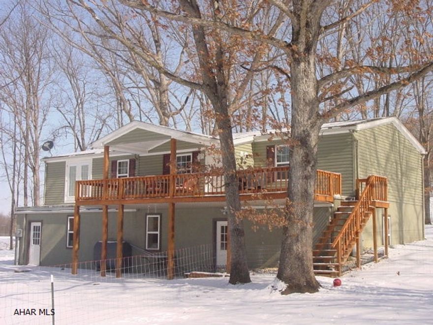 Hidden treasure near Chestnut Ridge Schools. A raised ranch on 11.3 acres with 4 bedrooms, 3 full baths and a finished basement including propane fireplace. The vinyl siding, windows, roof and furnace were recently replaced. The lot is large and private with above ground pool and attached wooden deck and outside space to enjoy. The newly built shed will stay as well. Call for appointment today!