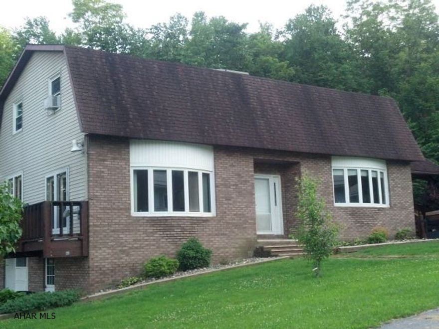 Beautiful home much larger than it looks! Barn roof style home (2) - 4 x 28 balcony decks, 10 x 22 covered porch, 3 bedroom with loft balcony overlooking foyer, sunken living room, pellet stove, formal dining room, huge master bedroom - so nice! Unfinished daylight - walkout basement, 1 car garage, paved driveway, stream to back of house, Must See!