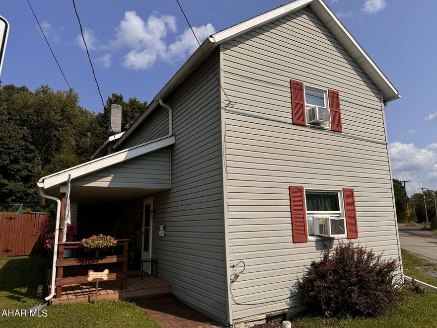 2 story vinyl sided home with 3 BRs, 1 3/4 baths. Eat-in kitchen, 1st floor laundry. Oil, HW baseboard heat. 2 car detached garage & 1 car detached garage.  Fenced yard.