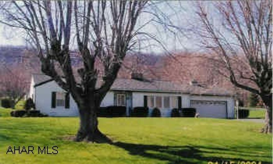 Ranch with 100'x208' lot, fireplace, central air and central vac.