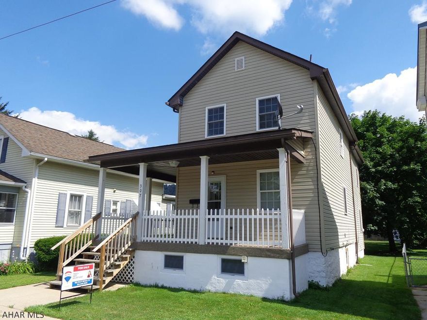 What a wonderful house this is!   Freshly painted & all new flooring except the master bedroom.  Spacious eat in kitchen & 1st floor laundry room. Fantastic, flat backyard with room to build a garage. Inviting porch with a white picket fence & deck. No flood insurance required.