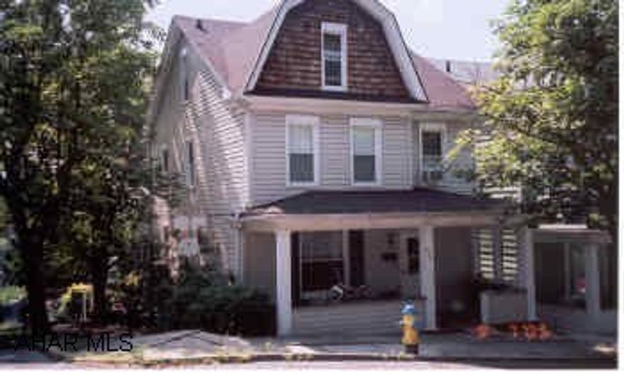 2 Story vinyl sided residence, kitchen, formal dining room, formal living room, 1 bath, 3 bedrooms, unfinished basement with laundry facilities.