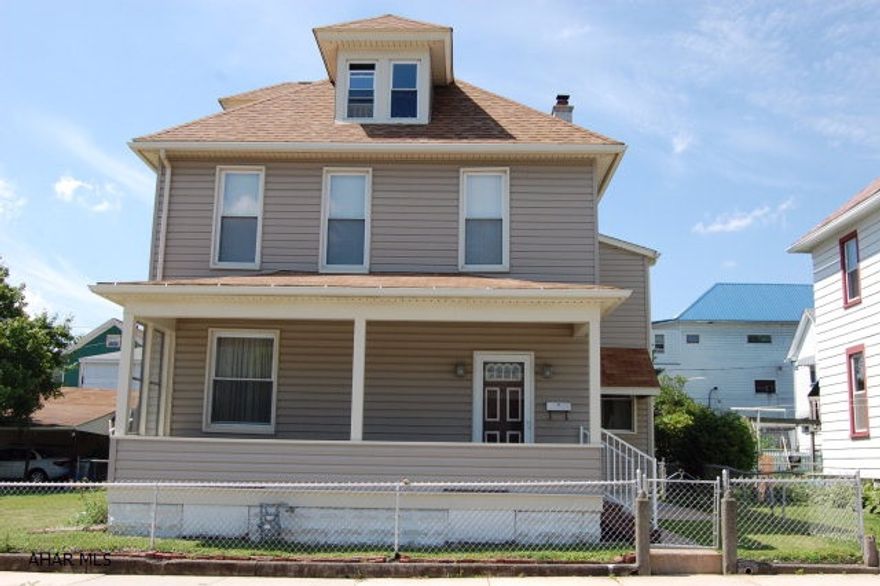 Great opportunity with this 4 bedroom 2 story house on a double lot.  Detached one car garage.  Hardwood floors throughout the 1st floor.  Plenty of updates include new furnace and windows in 2005 along with vinyl siding, Roof and front porch in 2013.  Vacant and ready for new owner.